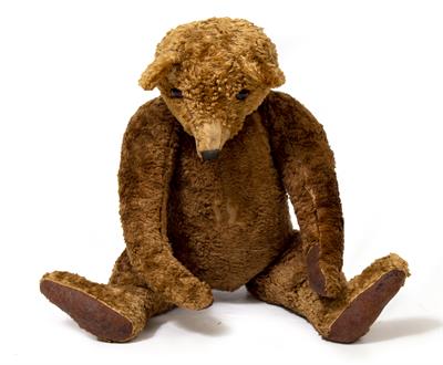 Lot 254 - AN EARLY TO MID 20TH CENTURY GERMAN JOINTED PLUSH CINNAMON GLASS EYED MOHAIR BEAR