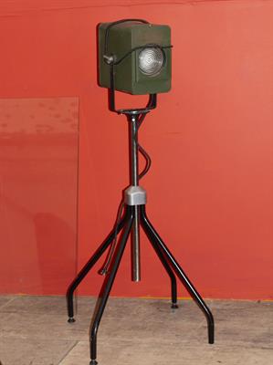 Lot 287 - A GREEN PAINTED TIN THEATRE LIGHT