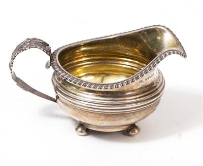 Lot 448 - A SILVER CREAM JUG