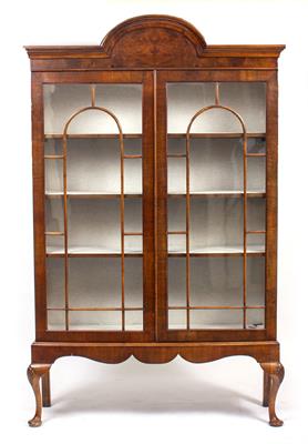 Lot 546 - A WALNUT BOOKCASE