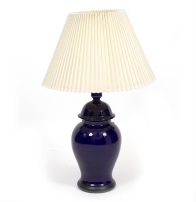 Lot 557 - A BLUE GLAZE TABLE LAMP