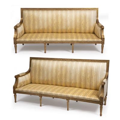 Lot 567 - A PAIR OF GILDED CREAM UPHOLSTERED SOFAS