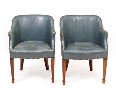 Lot 575 - A PAIR OF BLUE LEATHER UPHOLSTERED SIDE CHAIRS