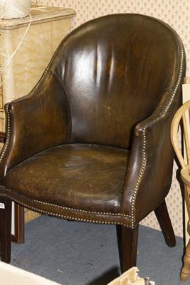 Lot 578 - A BROWN LEATHER TUB CHAIR