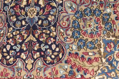 Lot 591 - A MIDDLE EASTERN RED AND BLUE GROUND RUG