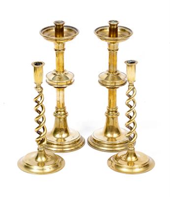 Lot 698 - A PAIR OF GOTHIC STYLE BRASS CANDLESTICKS