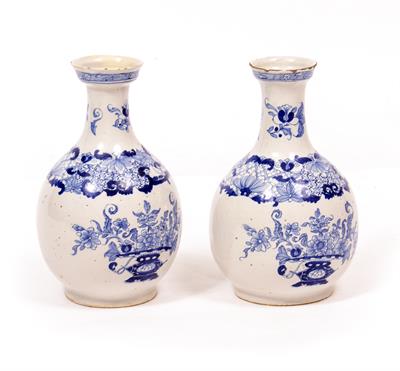 Lot 705 - A PAIR OF LATE 18TH / EARLY 19TH CENTURY BLUE AND WHITE DELFT WARE BOTTLE VASES