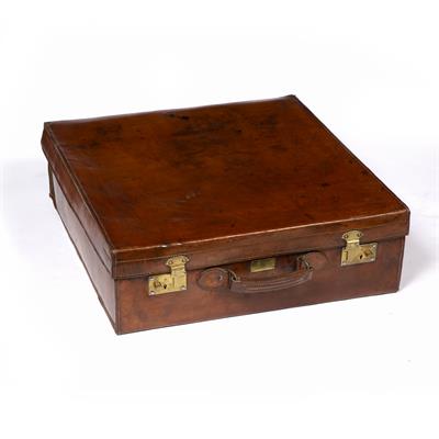 Lot 6 - A LATE 19TH/ EARLY 20TH CENTURY LEATHER SUITCASE of square form