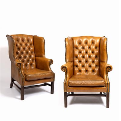 Lot 15 - A PAIR OF LIBRARY WING ARMCHAIRS with brass studded buttoned leather upholstery