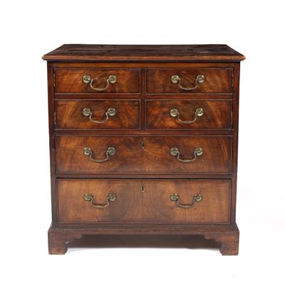 Lot 20 - A GEORGE III MAHOGANY COMMODE CHEST having a pair of doors panelled as four small drawers