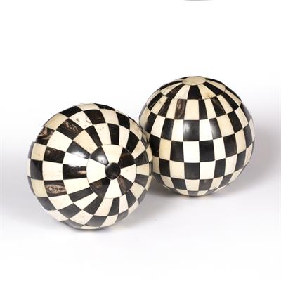 Lot 31 - TWO NATURAL AND BLACK STAINED BONE VENEERED DECORATIVE BALLS with chequered decoration