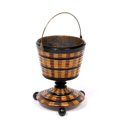 Lot 37 - A 19TH CENTURY DUTCH FRUITWOOD AND EBONISED PEDESTAL COAL BUCKET inlaid with alternating vertical