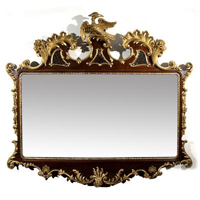 Lot 63 - AN 18TH CENTURY STYLE MAHOGANY AND GILT WALL MIRROR the shaped and pierced top with gilt ho ho bird