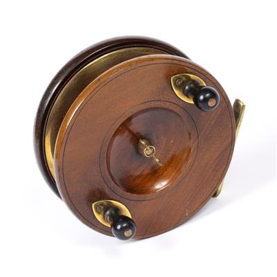 Lot 85 - A MAHOGANY AND BRASS MOUNTED HEATON'S 'ETON SUN' STAR BACK FISHING REEL stamped 'Eton Sun'