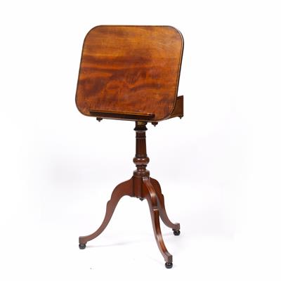 Lot 128 - AN EARLY 19TH CENTURY MAHOGANY AND EBONY STRUNG READING TABLE the adjustable rectangular top with