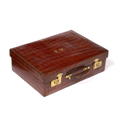 Lot 142 - AN ALLIGATOR SKIN SUITCASE