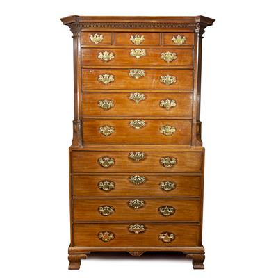 Lot 249 - AN 18TH CENTURY IRISH MAHOGANY TALLBOY CHEST the upper section with fluted and canted angles