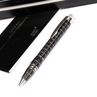 Lot 260 - A MONT BLANC BALLPOINT PEN with chequered matt black body