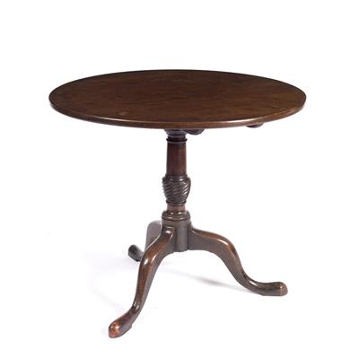 Lot 294 - A GEORGE III MAHOGANY CIRCULAR TILT TOP OCCASIONAL TABLE on turned column and tripod base