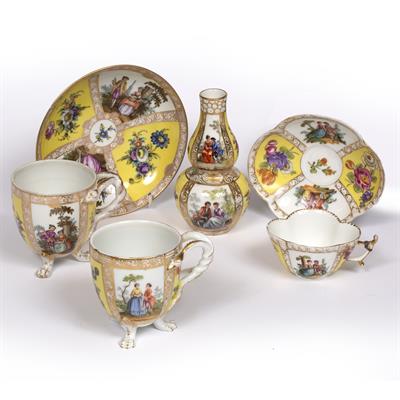 Lot 304 - A 19TH CENTURY MEISSEN CABINET CUP AND SAUCER painted with alternating panel of courting couples and