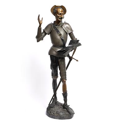 Lot 333 - AN EARLY 20TH CENTURY CONTINENTAL FRENCH PATINATED METAL FIGURE of Don Quixote reading Amadis Da