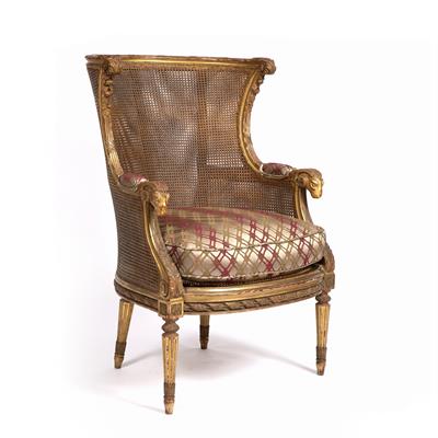 Lot 358 - A 19TH CENTURY FRENCH GILDED BEECHWOOD AND DOUBLE CANE SHAPED BACK ARMCHAIR with acanthus and ram's