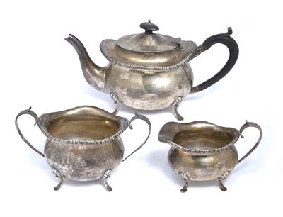 Lot 381 - Silver three piece tea set