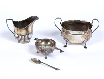 Lot 396 - Silver tea strainer and spoon