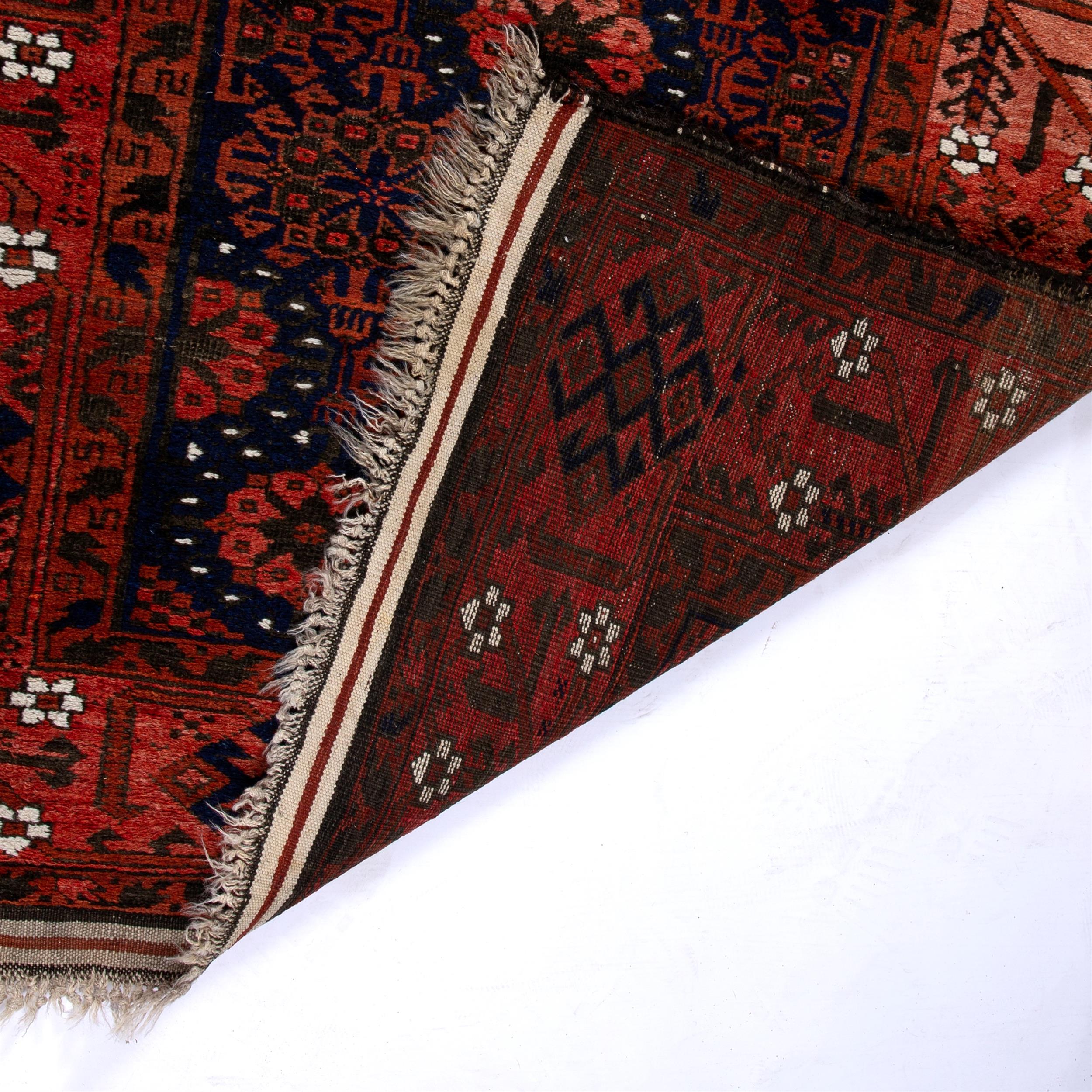 Lot 117 - Turkish pale red ground rug