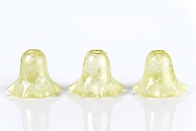 Lot 277 - Three Vaseline glass lamp shades