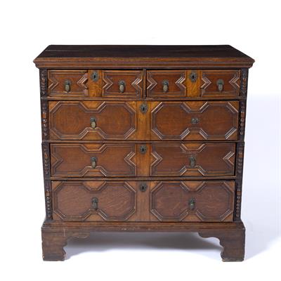 Lot 131 - Oak and walnut moulded front chest of drawers