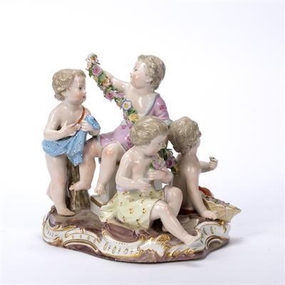 Lot 210 - Porcelain putti group