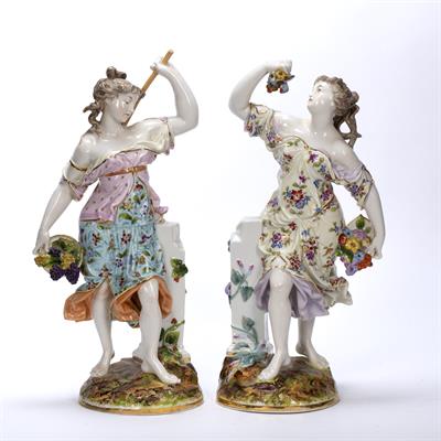 Lot 217 - Pair of porcelain models of fruit gatherers