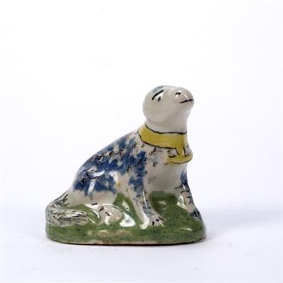 Lot 227 - Delftware model of a dog