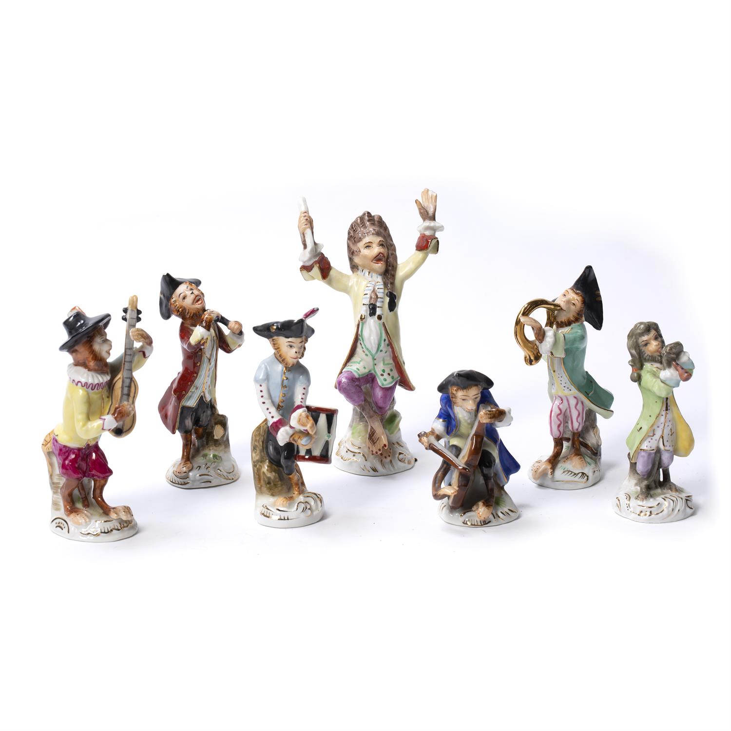 Lot 245 - Collection of seven monkey band porcelain figurines
