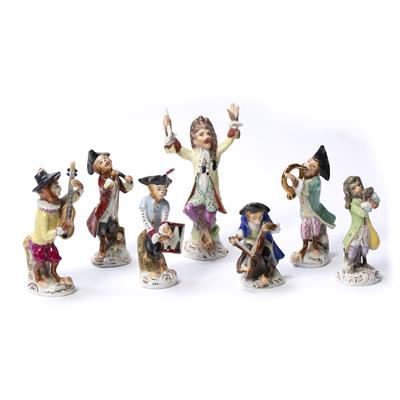 Lot 245 - Collection of seven monkey band porcelain figurines