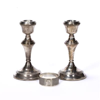 Lot 309 - Pair of silver candlesticks