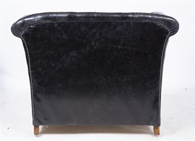 Lot 44 - A BLACK LEATHER UPHOLSTERED HIGH BACKED WINDOW SEAT OR SOFA