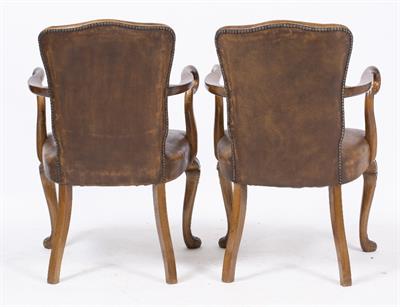 Lot 85 - A PAIR OF GEORGE II STYLE WALNUT BROWN LEATHER UPHOLSTERED OPEN ARMCHAIRS