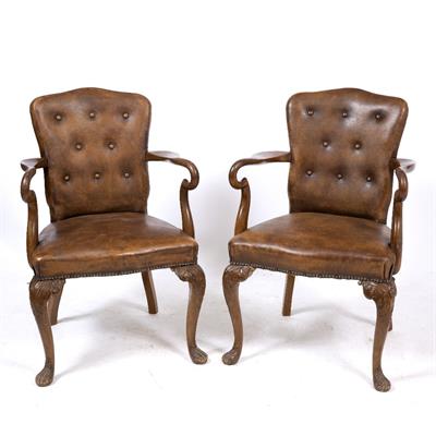 Lot 85 - A PAIR OF GEORGE II STYLE WALNUT BROWN LEATHER UPHOLSTERED OPEN ARMCHAIRS