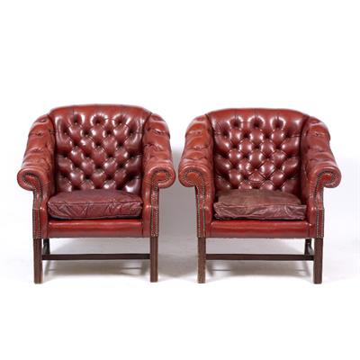 Lot 86 - A PAIR OF RED LEATHER ARMCHAIRS