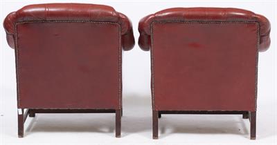 Lot 86 - A PAIR OF RED LEATHER ARMCHAIRS