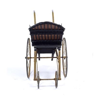 Lot 88 - AN EARLY VICTORIAN IRON PAINTED WOOD AND WICKER CHILD'S PRAM