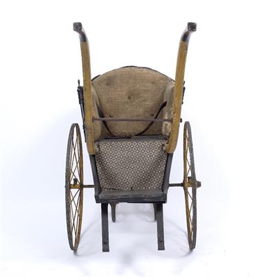 Lot 88 - AN EARLY VICTORIAN IRON PAINTED WOOD AND WICKER CHILD'S PRAM