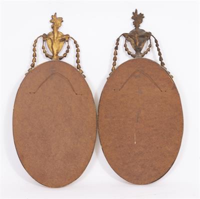 Lot 102 - A PAIR OF NEO CLASSICAL STYLE OVAL MIRRORS