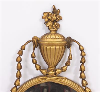 Lot 102 - A PAIR OF NEO CLASSICAL STYLE OVAL MIRRORS