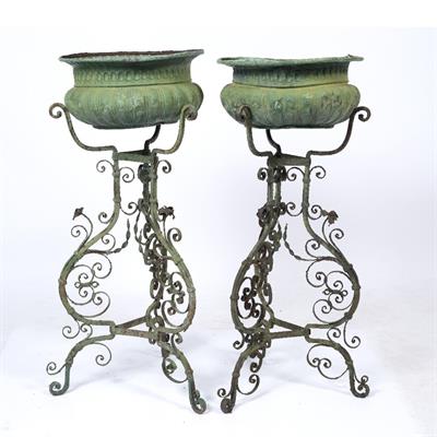 Lot 104 - A PAIR OF EARLY 20TH CENTURY FRENCH PRESSED COPPER JARDINIERES