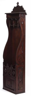 Lot 105 - A 19TH CENTURY CARVED OAK GUN CABINET