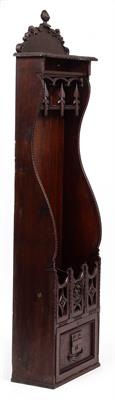 Lot 105 - A 19TH CENTURY CARVED OAK GUN CABINET