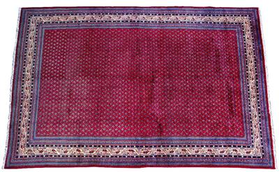 Lot 114 - AN ARAAK RED GROUND RUG